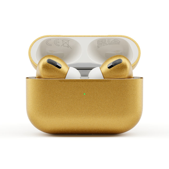 AirPods colored Gold with AirPods inside the case